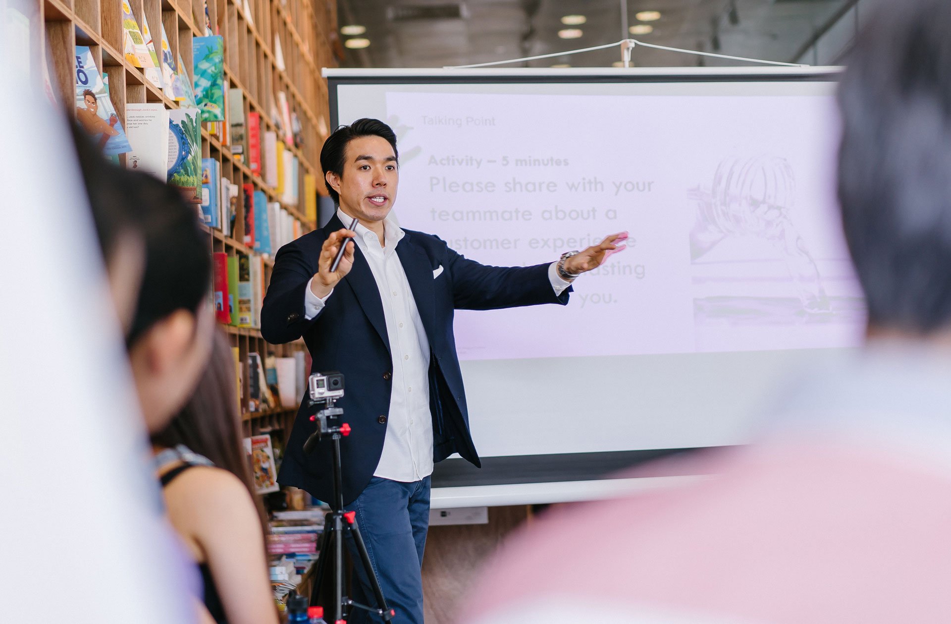 a driven and entrepreneurial representative giving a presentation