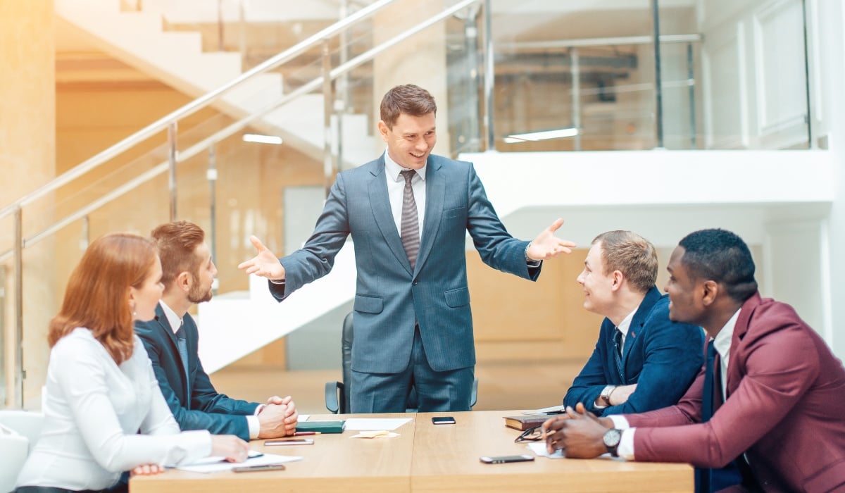 Businessman presenting to colleagues